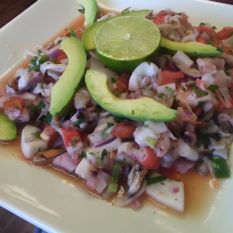 Mi Rinconcito's Mexican ceviche, a vibrant mix of seafood, avocado, lime, and fresh vegetables.